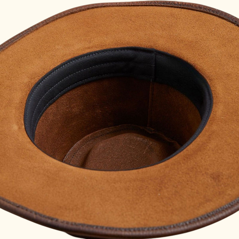 Interior view of the Walker leather hat showing soft suede finish and comfortable inner band padding