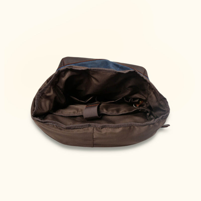 Waxed Canvas Laptop Backpack - A rugged and stylish backpack, designed to protect and carry your laptop and essentials in all your daily endeavors.
