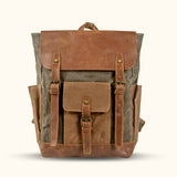 Waxed Canvas Leather Laptop Backpack - A rugged and sophisticated backpack designed to safeguard your laptop and essentials in style and durability.